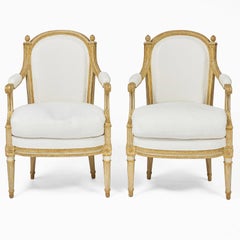 Ensemble de quatre Fauteuils en Cabriolet peints et dorés à la parclose de style Louis XVI