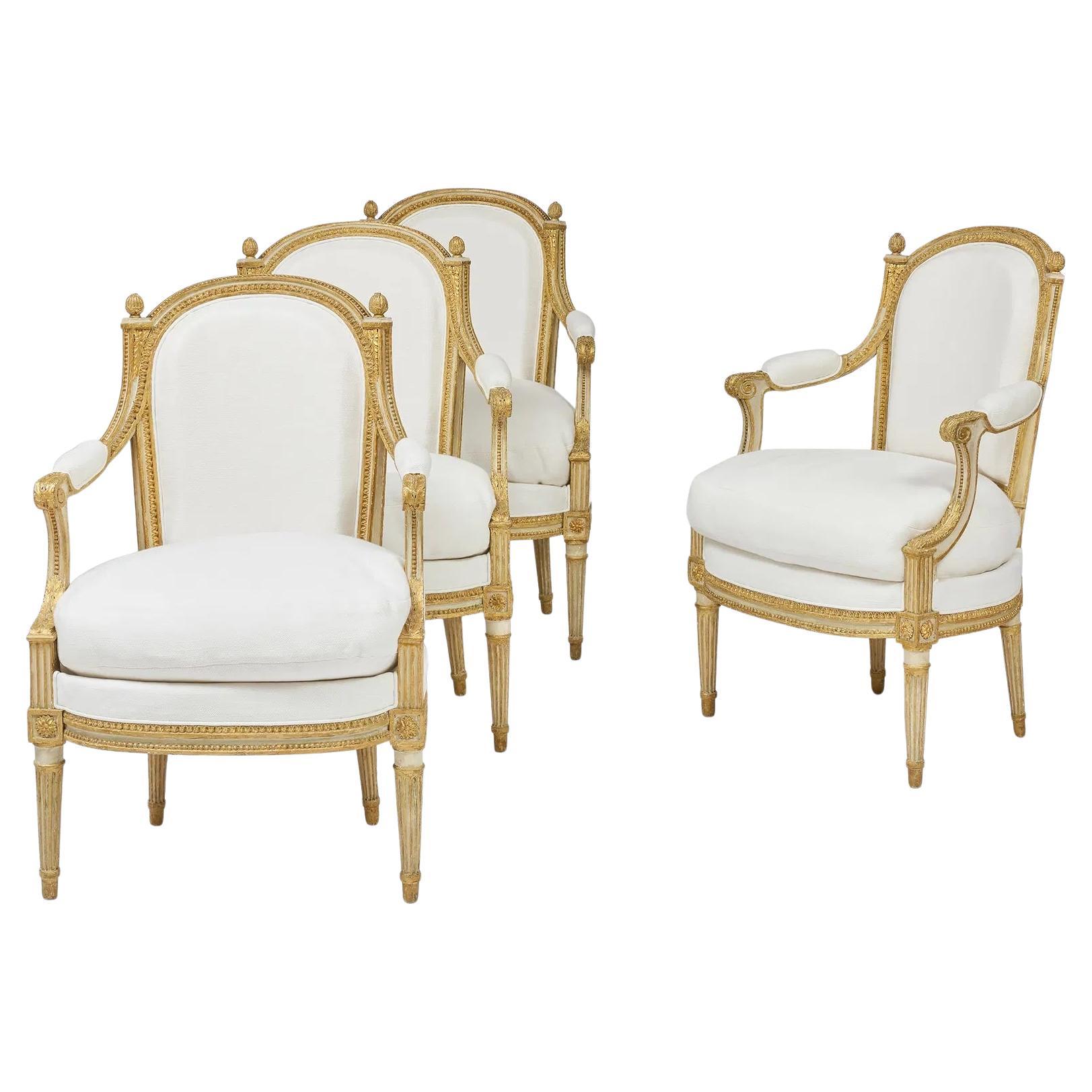 Set of Four Louis XVI Painted and Parcel-Gilt Fauteuils en Cabriolet For Sale