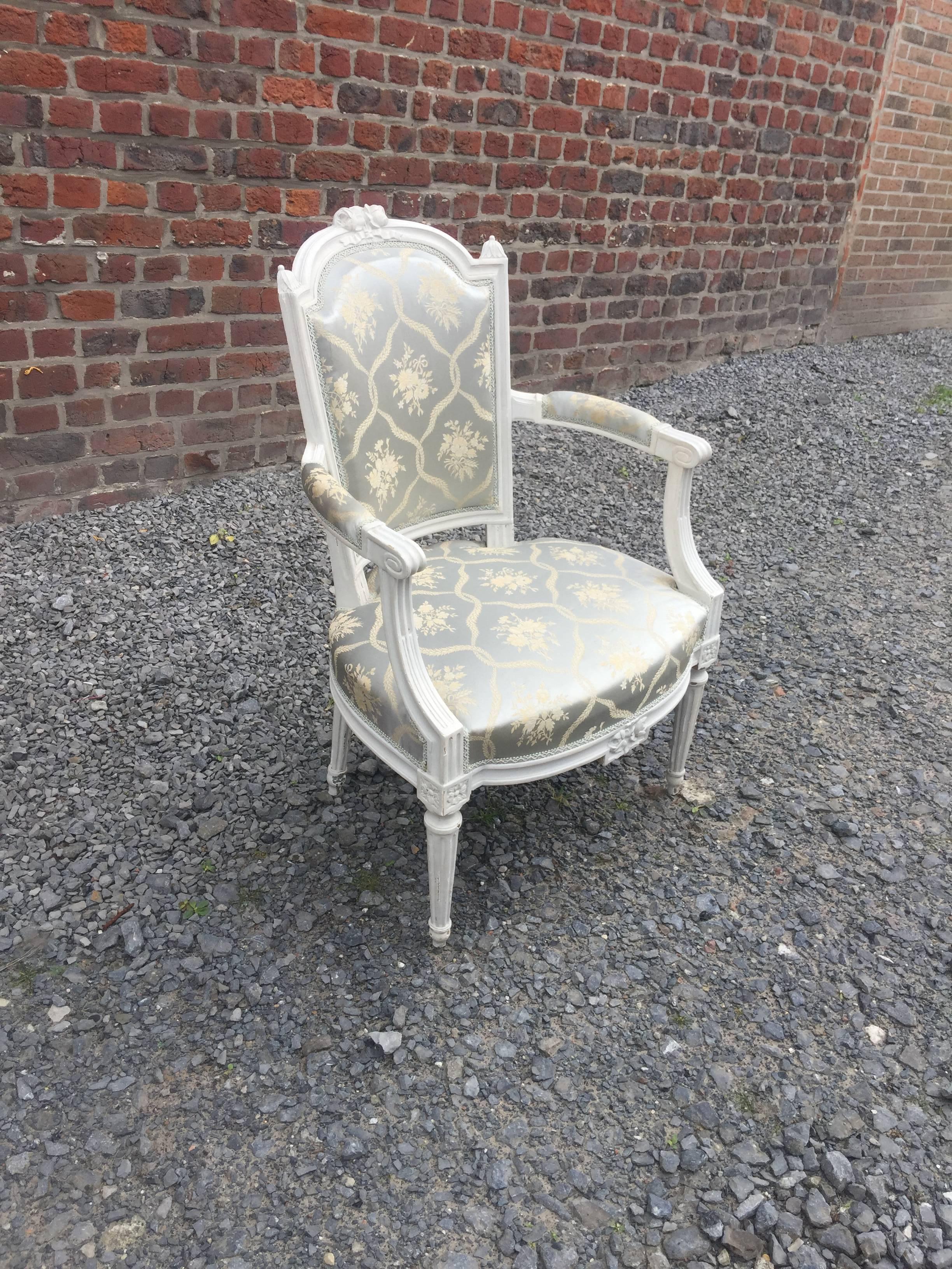 Set of four Louis XVI style armchairs, 19th century.
Hand-painted wood and silk.
 