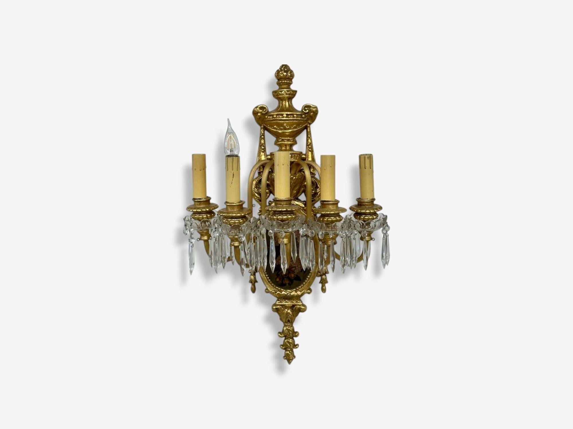 Luigi XVI Set of Four Louis XVI Style Bronze and Crystal Rams Head Five Light Sconces in vendita