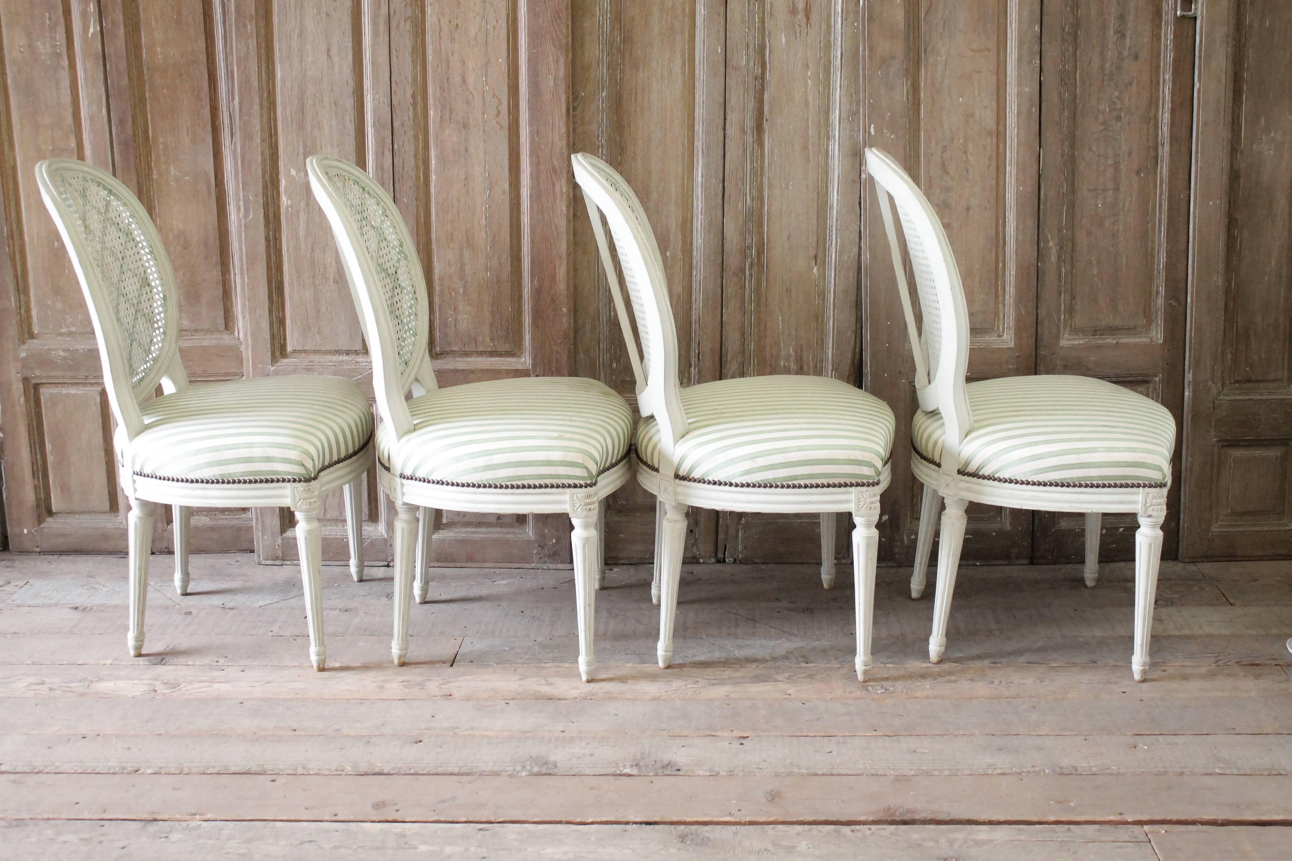Set of Four Louis XVI Style French Painted Cane Back Dining Chairs 3