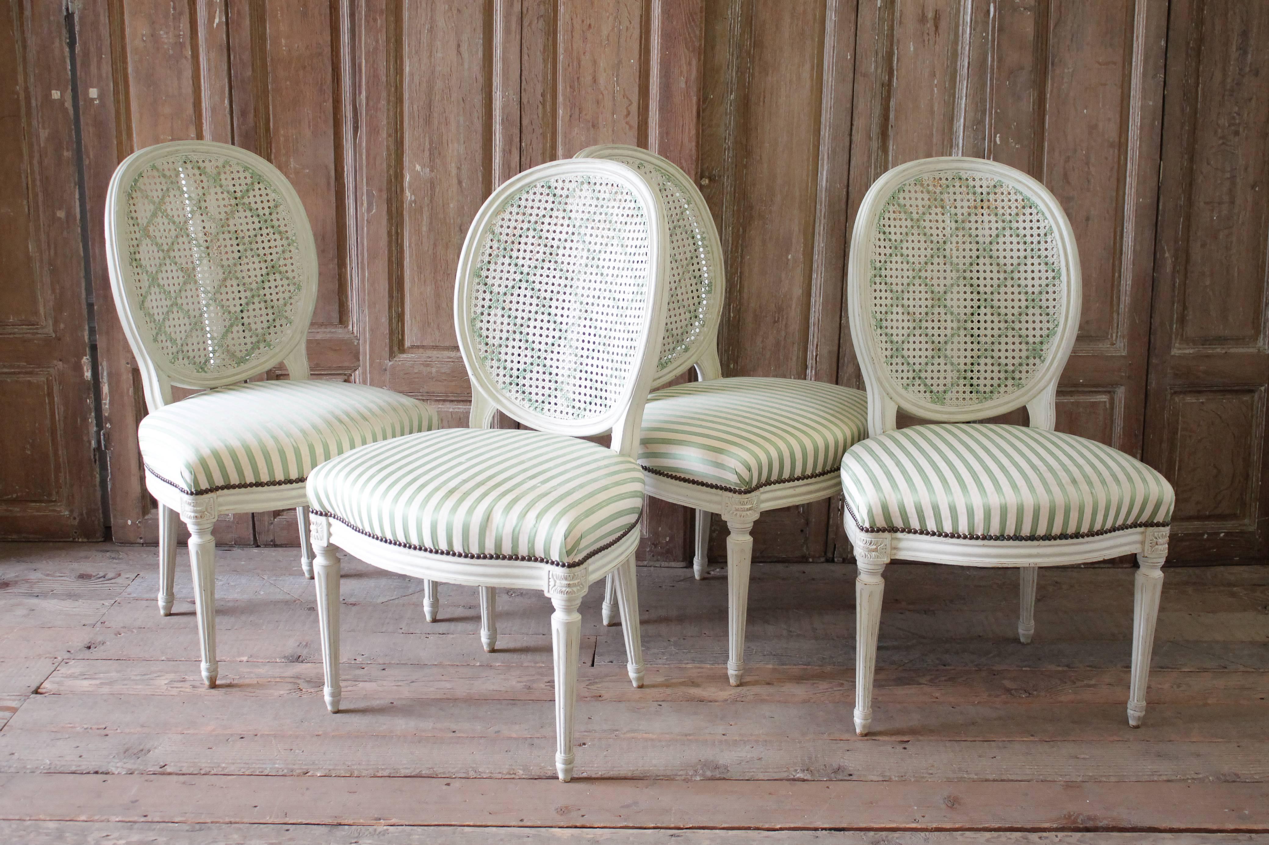 Set of Four Louis XVI Style French Painted Cane Back Dining Chairs 4
