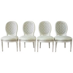 Set of Four Louis XVI Style French Painted Cane Back Dining Chairs