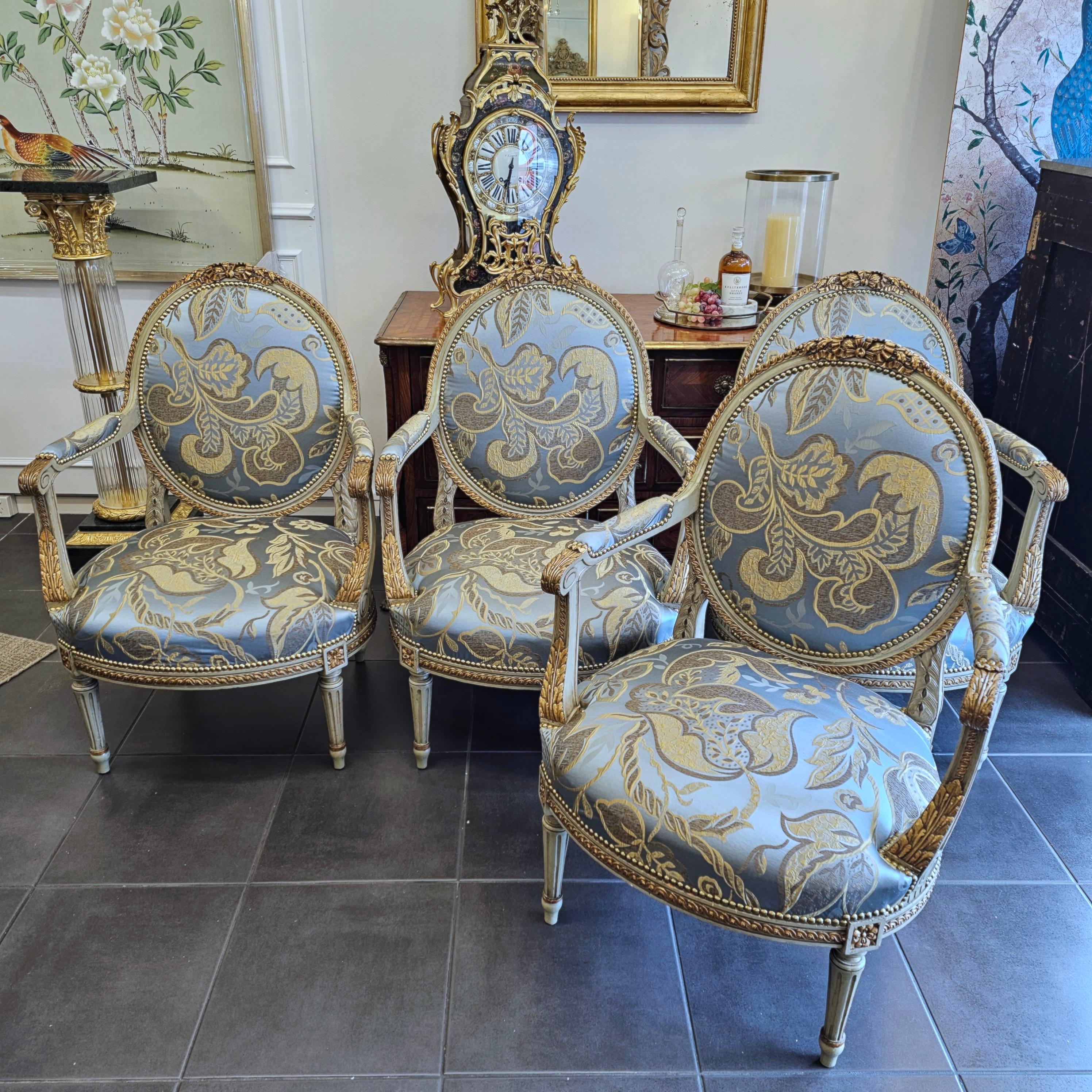 Set of Four Louis XVI Style Painted and Giltwood Fauteuils

A set of four (4) Louis XVI Style Medallion “en cabriolet” that are perfectly proportioned, comfortable and exceptionally elegant.

Painted in soft french green/grey with gilt accents,