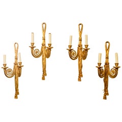 Set of Four Louis XVI Style Sculptured Ribbon & Tassel Form 2-Light Wall Sconces