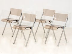 Set of Four Lucite Folding Chairs