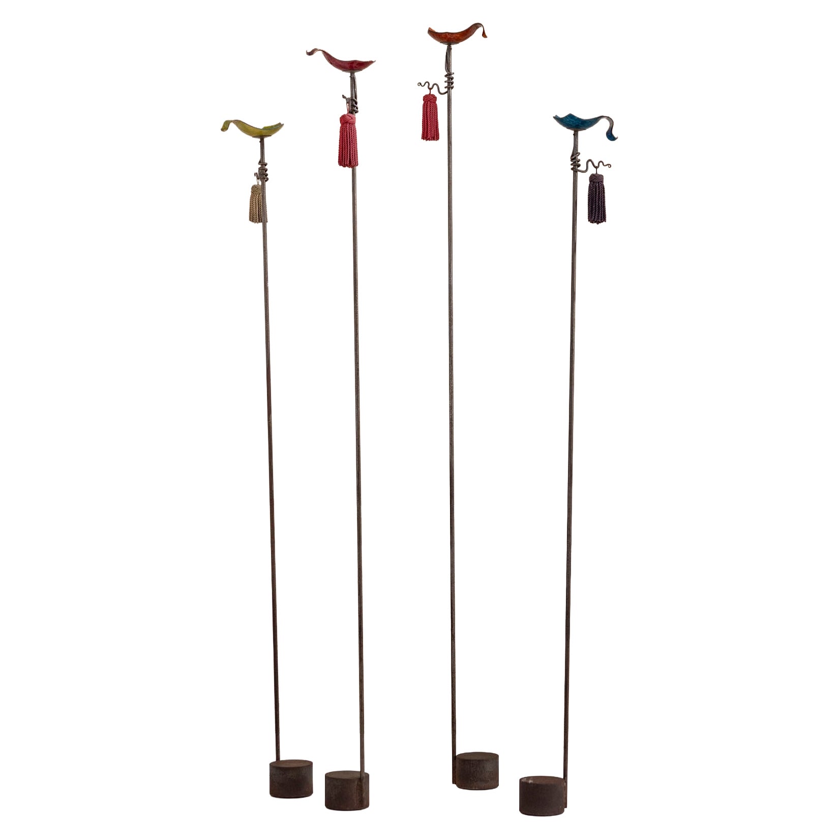 Set of Four Luminotto floor candlesticks by Toni Cordero, Italy, 1992.