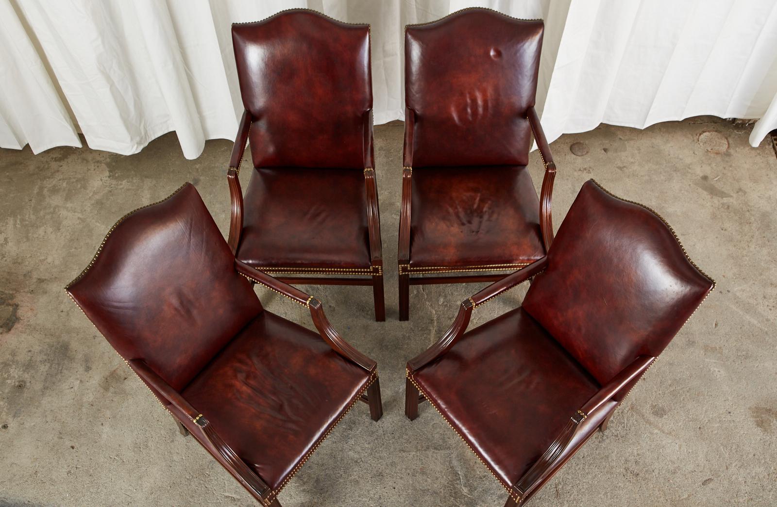 Georgian Set of Four Mahogany Gainsborough Leather Library Armchairs