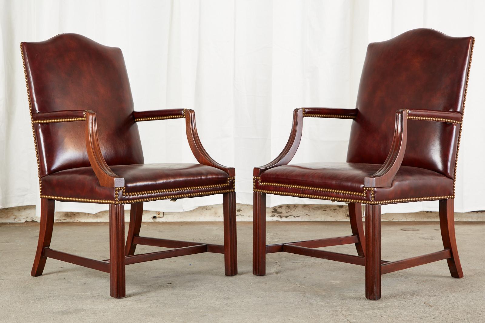 American Set of Four Mahogany Gainsborough Leather Library Armchairs