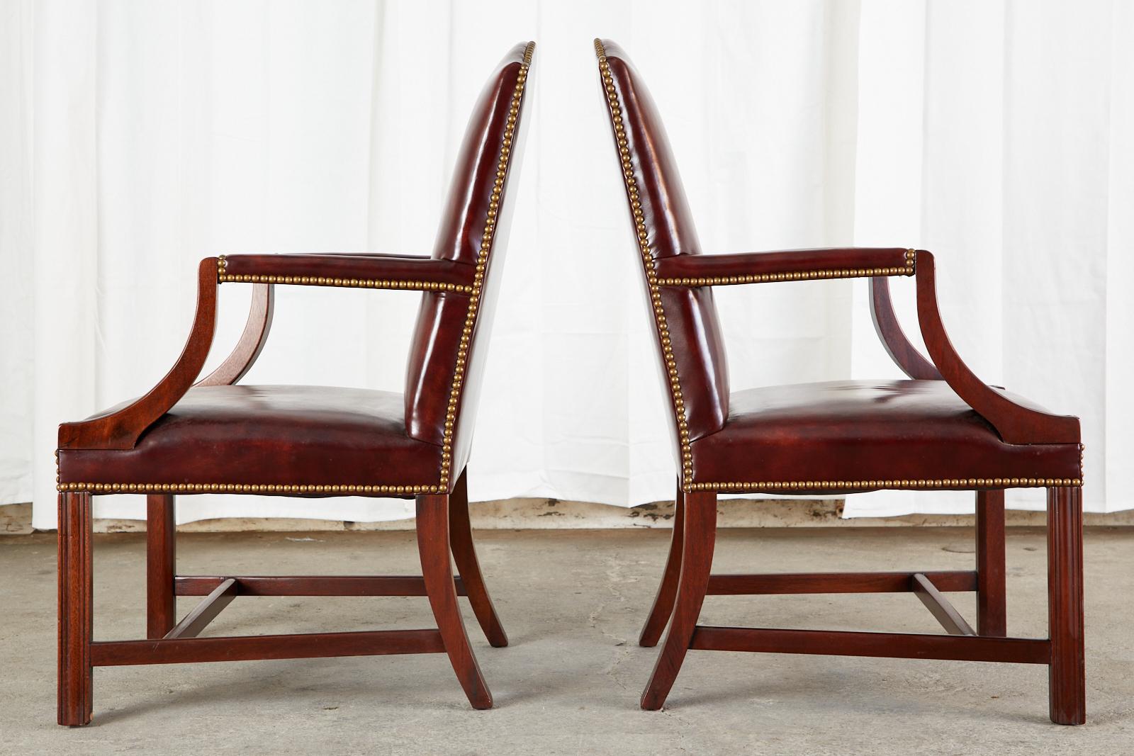 20th Century Set of Four Mahogany Gainsborough Leather Library Armchairs