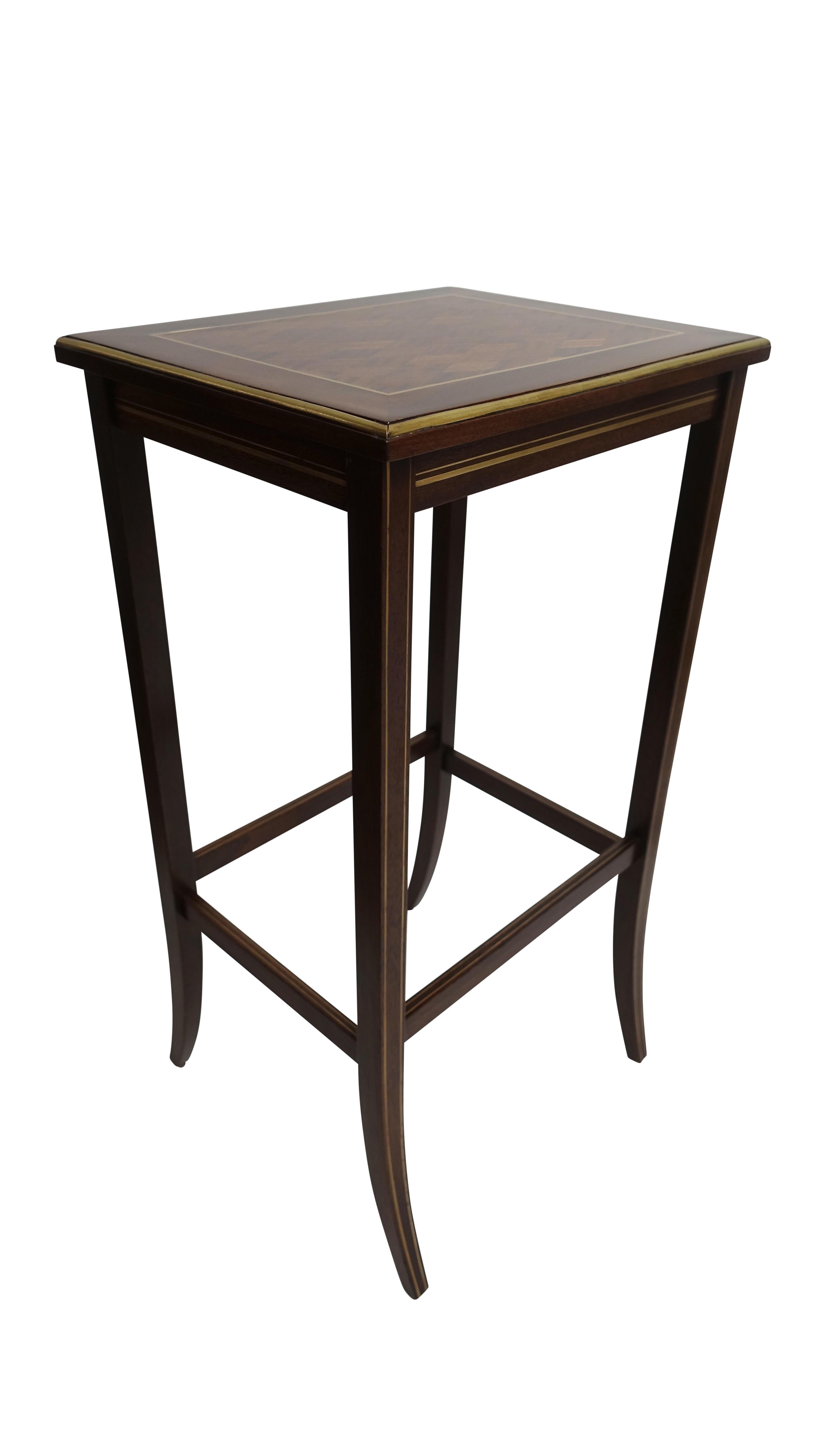 American Set of Four Mahogany Nesting Tables with Brass Inlay and Trim, Mid-20th Century For Sale