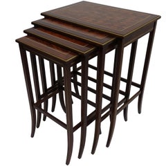 Retro Set of Four Mahogany Nesting Tables with Brass Inlay and Trim, Mid-20th Century