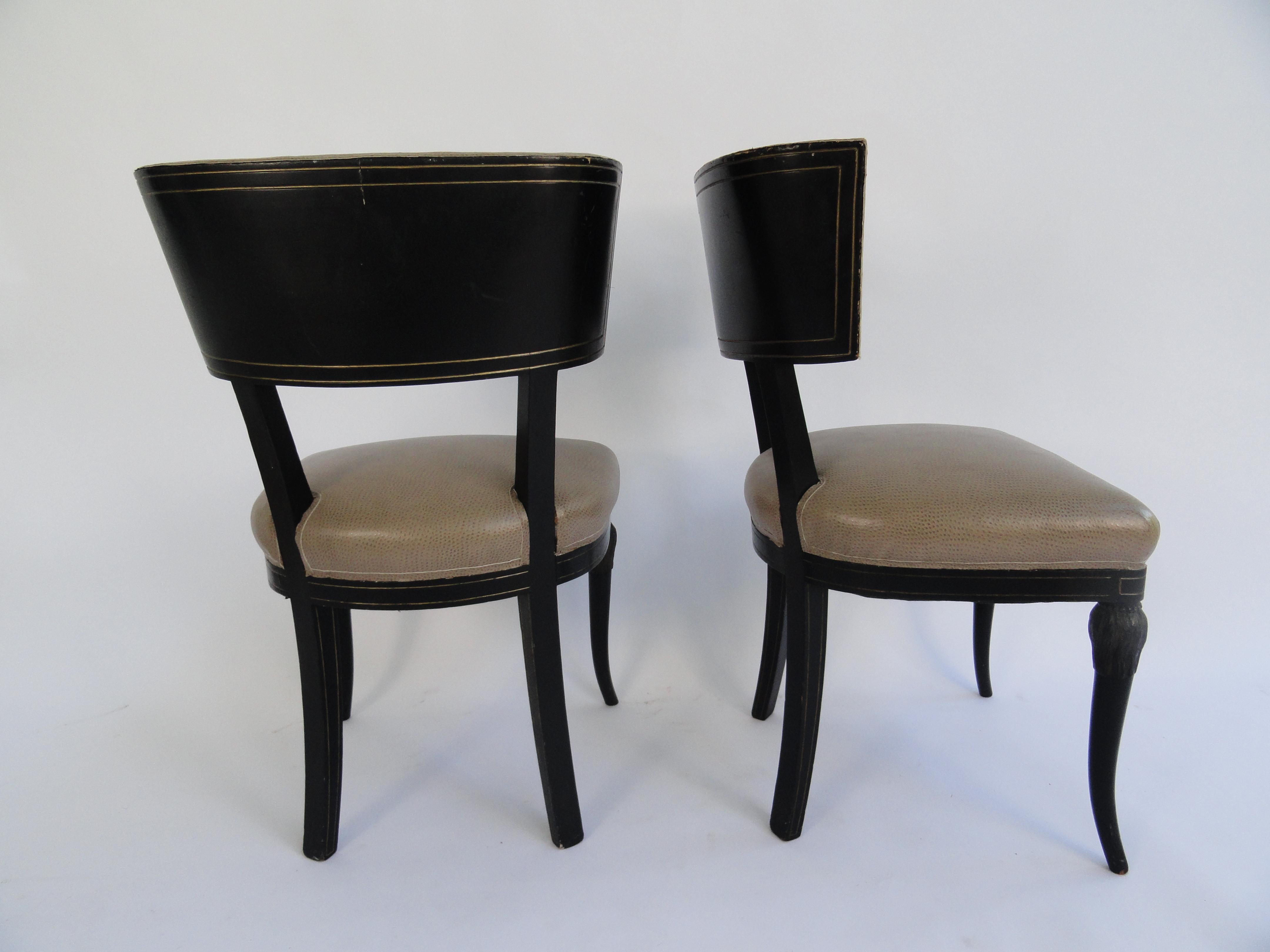 Set of four Maison Jansen side chairs with original ebony finish with gilt detail. Upholstered in faux ostrich.
