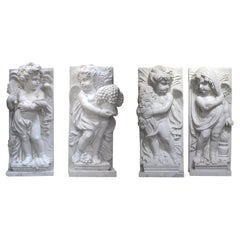 Set of Four Marble Plates with Cherubs, "The Four Seasons"