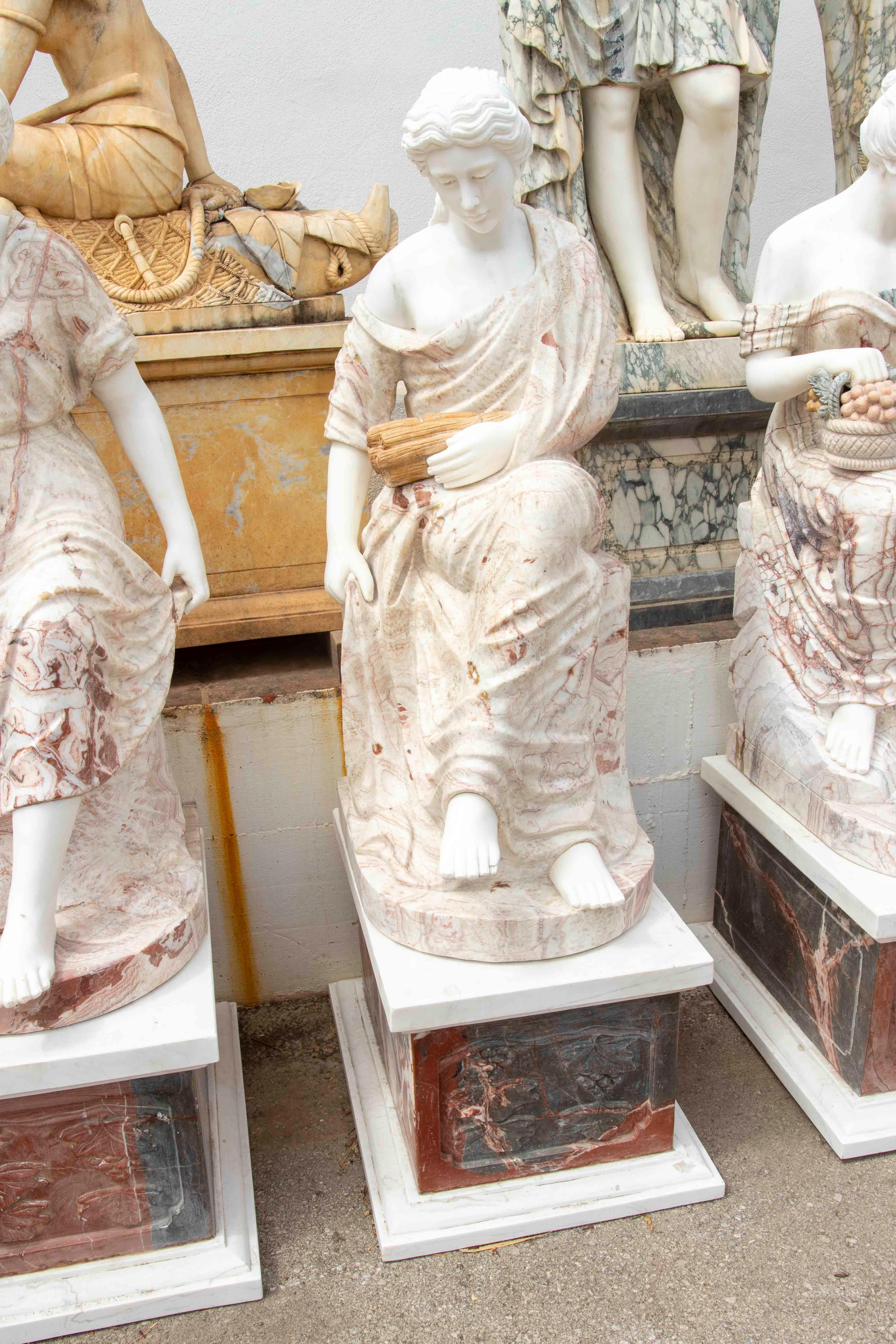 Set of Four Marble Sculptures of Seated Classical Ladies with Pedestals In Good Condition For Sale In Marbella, ES