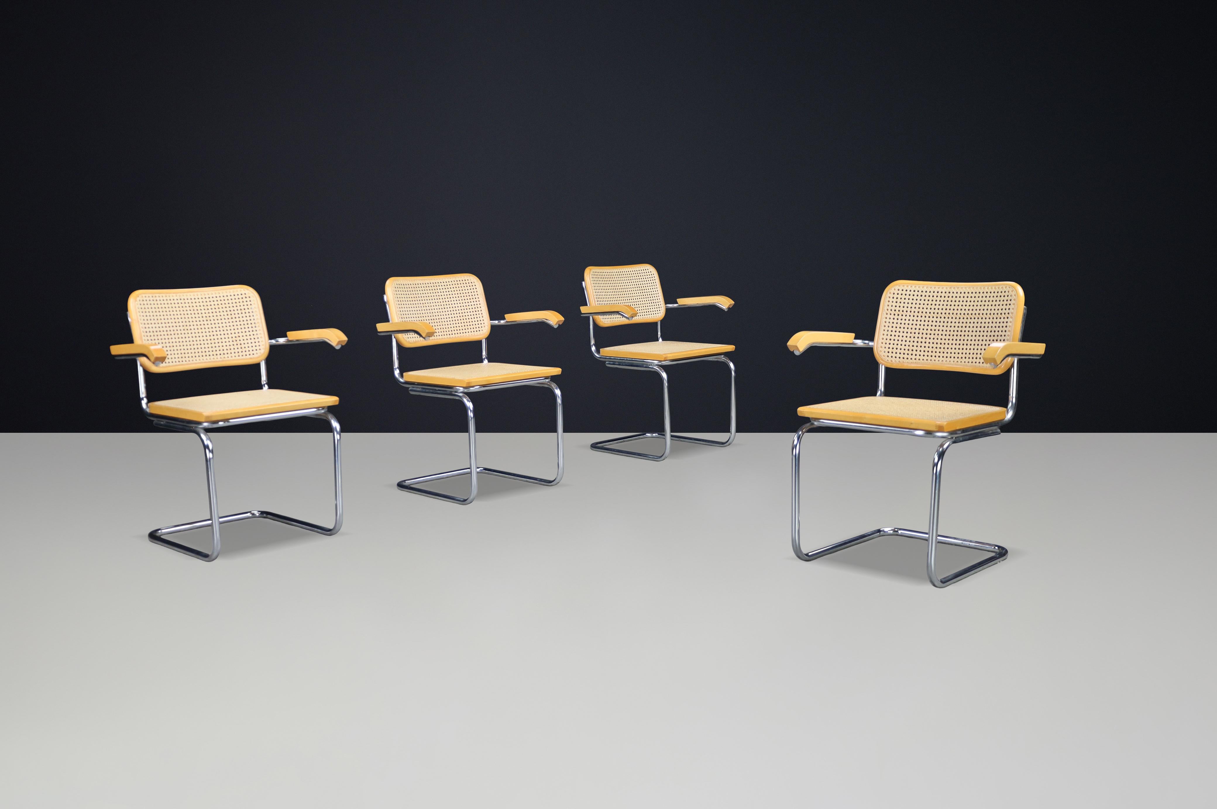 Set of Four Marcel Breuer B32 Cesca Arm Chairs, Italy, 1970s

An enduring icon of Bauhaus design, the B32 Cesca Arm Chair by Marcel Breuer remains one of the most influential seating designs of the 20th century. This rare set of four, produced in