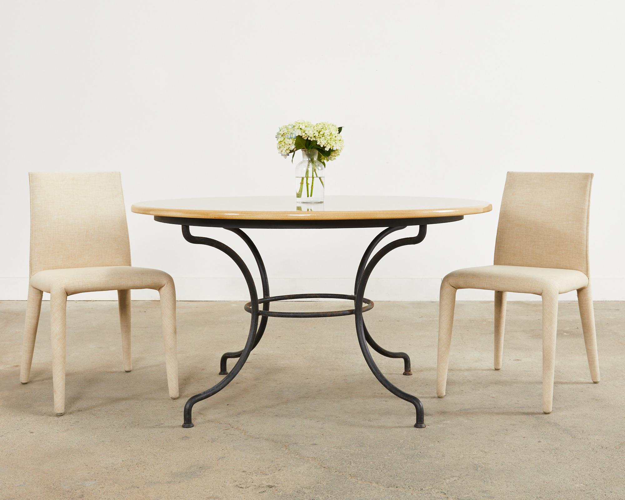 Stylish set of four Italian dining chairs designed by Mario Bellini for B and B Italia. The chairs feature a molded steel and foam frame with a removable fabric cover that fits like a fine Italian suit. The fabric is tightly woven in a neutral beige