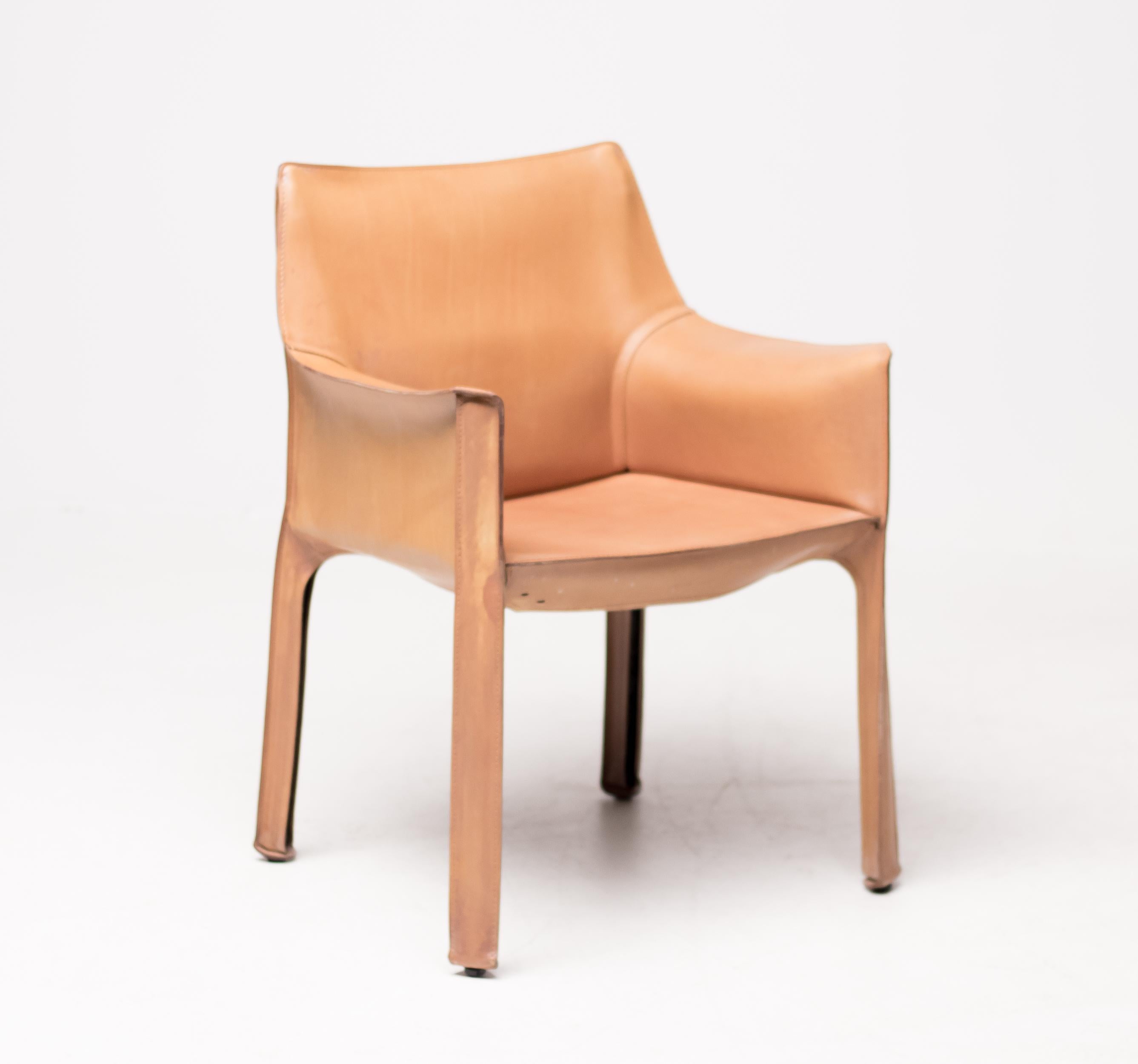 Bellini for Cassina cab chairs in natural Italian leather. High-quality chairs consisting of a leather cover stretched over a minimal tubular steel frame. The only additional reinforcement is provided by a rubber membrane plate that supports the