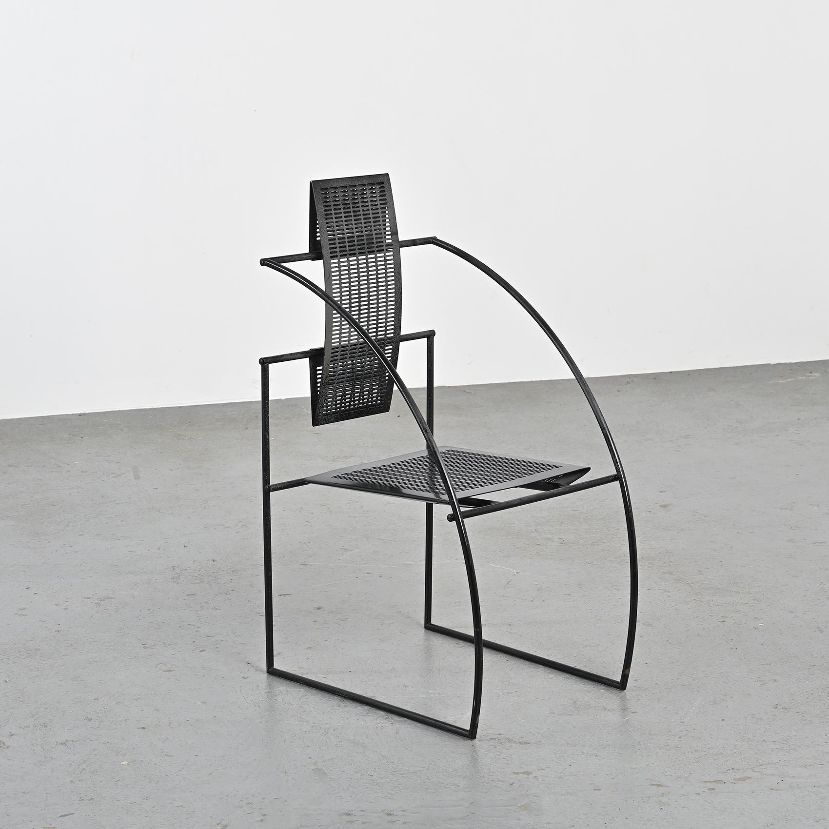 Set of 4 chairs model 605 also known as Quinta by the Italian designer Mario Botta, 

Black lacquered steel structure, seat and back in black perforated sheet steel. 

We have numerous SKUs in stock, condition may slightly vary but we can easily