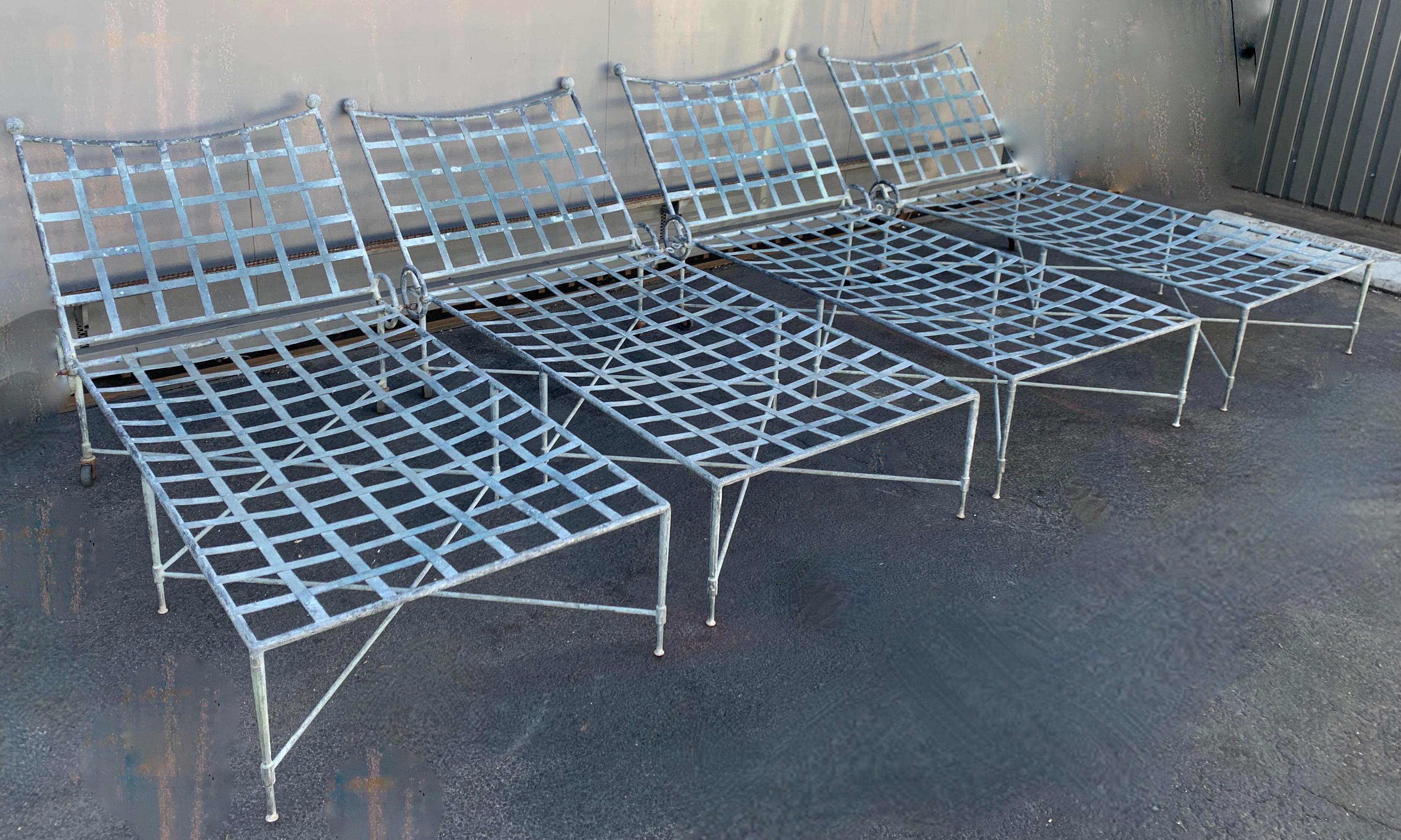 A Set of four Mario Papperzini for John Salterini pool lounges - the four are in the original verdigris finish with stationary reclined backs. We can fabricate cushions with COM. The condition overall is good with some expected loss to the rear of