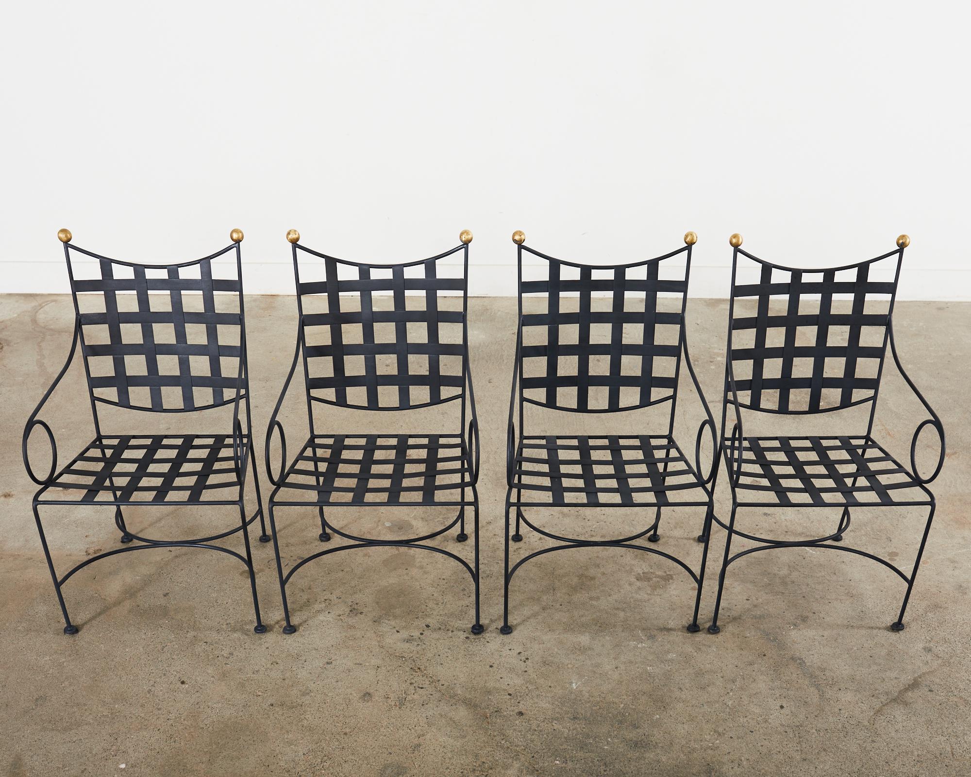 Bronze Ensemble de quatre chaises de salle à manger de style Mario Papperzini en fer et bronze  en vente