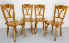 Set of Four Massive Oak Chairs with Hunting Crests France, Mid-20th Century