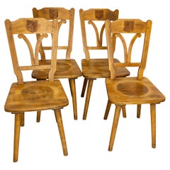 Set of Four Massive Oak Chairs with Hunting Crests France, Mid-20th Century
