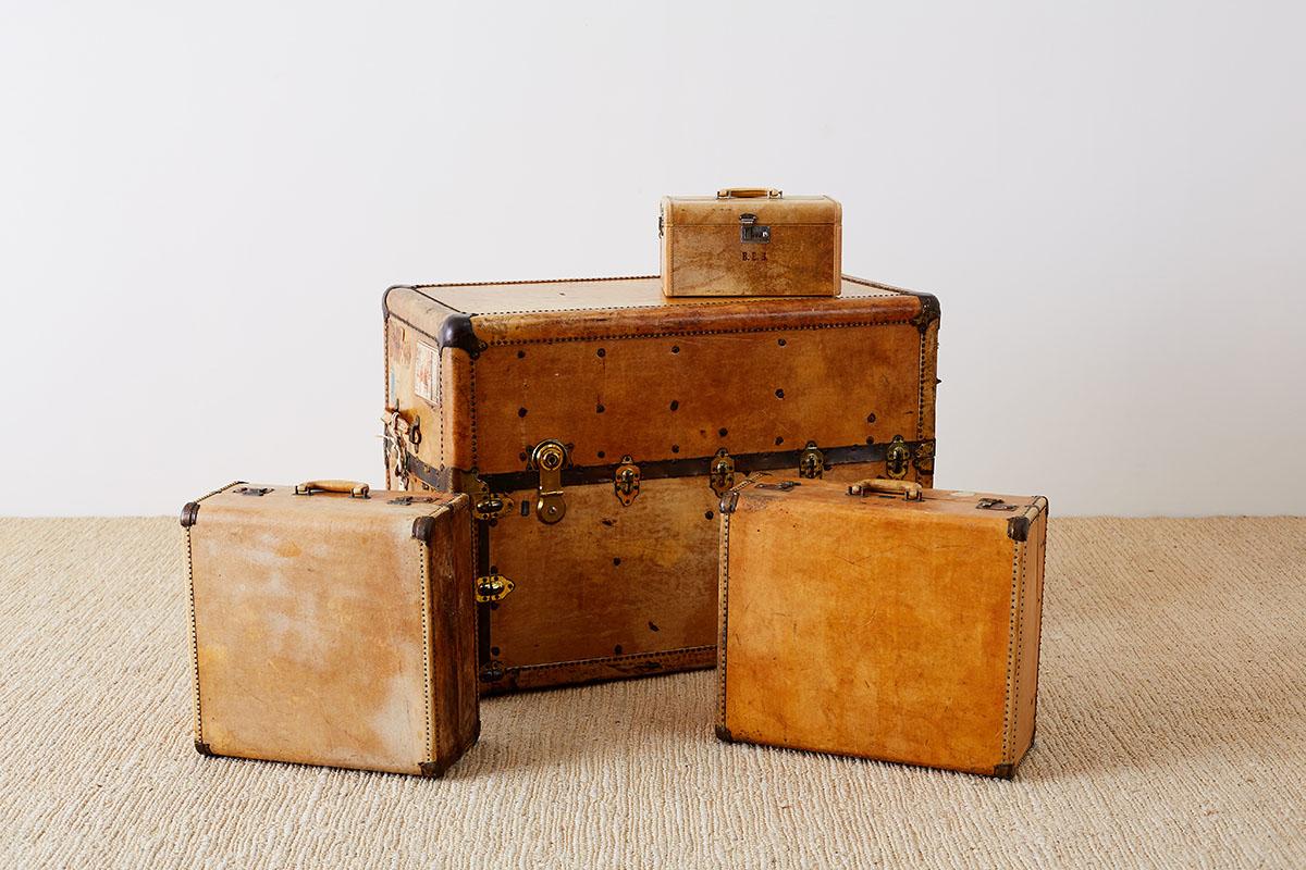 Set of Four Matching Steamer Trunk and Luggage 11