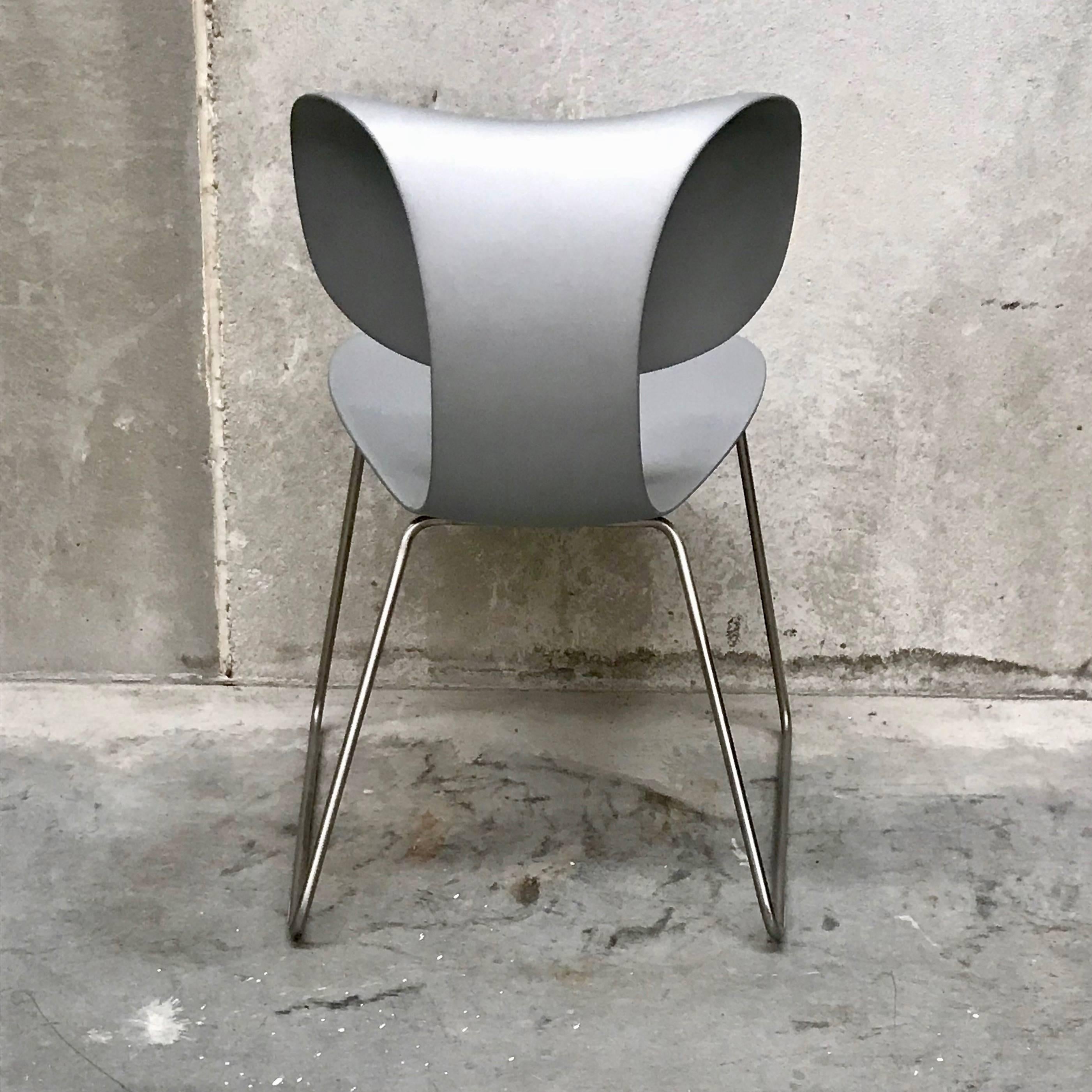 The Maxima chair by William Sawaya for Sawaya & Moroni are designed by William Sawaya 2002. The chairs are a flexible moulded plastic seat with a stainless steel sled base.