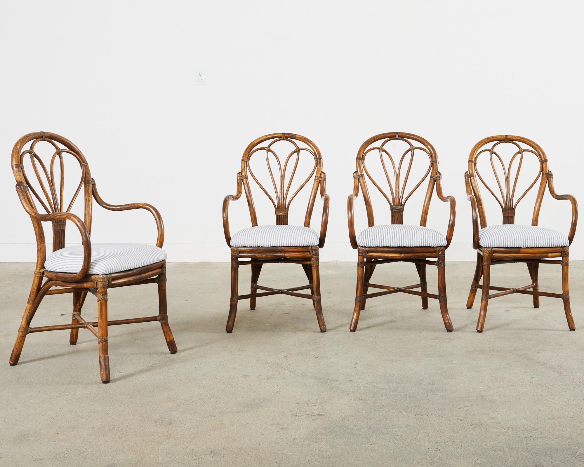 Hand-Crafted Set of Four McGuire Art Nouveau Style Rattan Dining Armchairs For Sale