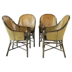 Set of four McGuire Bamboo with cane leather seat Belden dining chairs