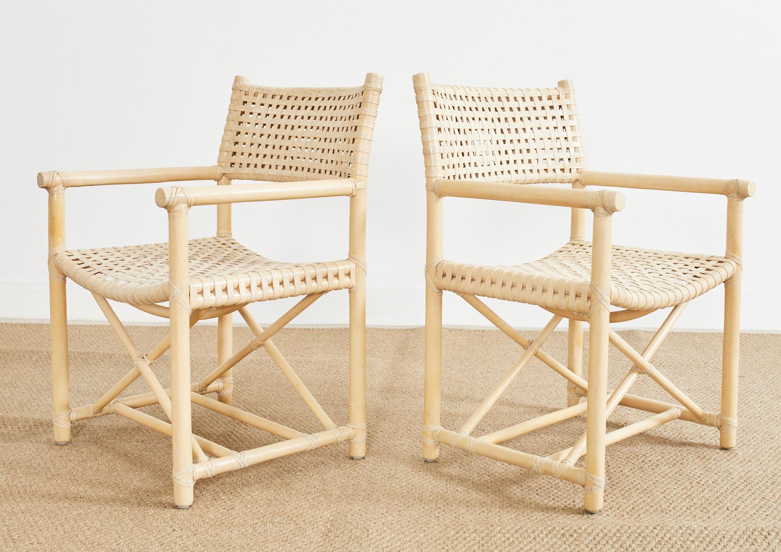 Hand-Crafted Set of Four McGuire Blonde Rattan Laced Rawhide Dining Armchairs