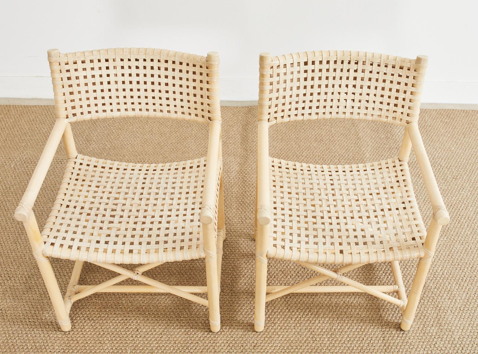 Set of Four McGuire Blonde Rattan Laced Rawhide Dining Armchairs In Good Condition In Rio Vista, CA