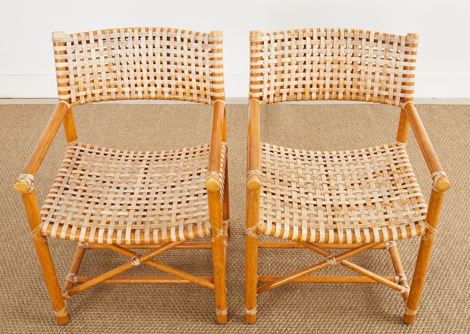 Hand-Crafted Set of Four McGuire Laced Rawhide Rattan Dining Armchairs For Sale