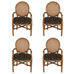 Set of Four McGuire Style Caned Armchairs