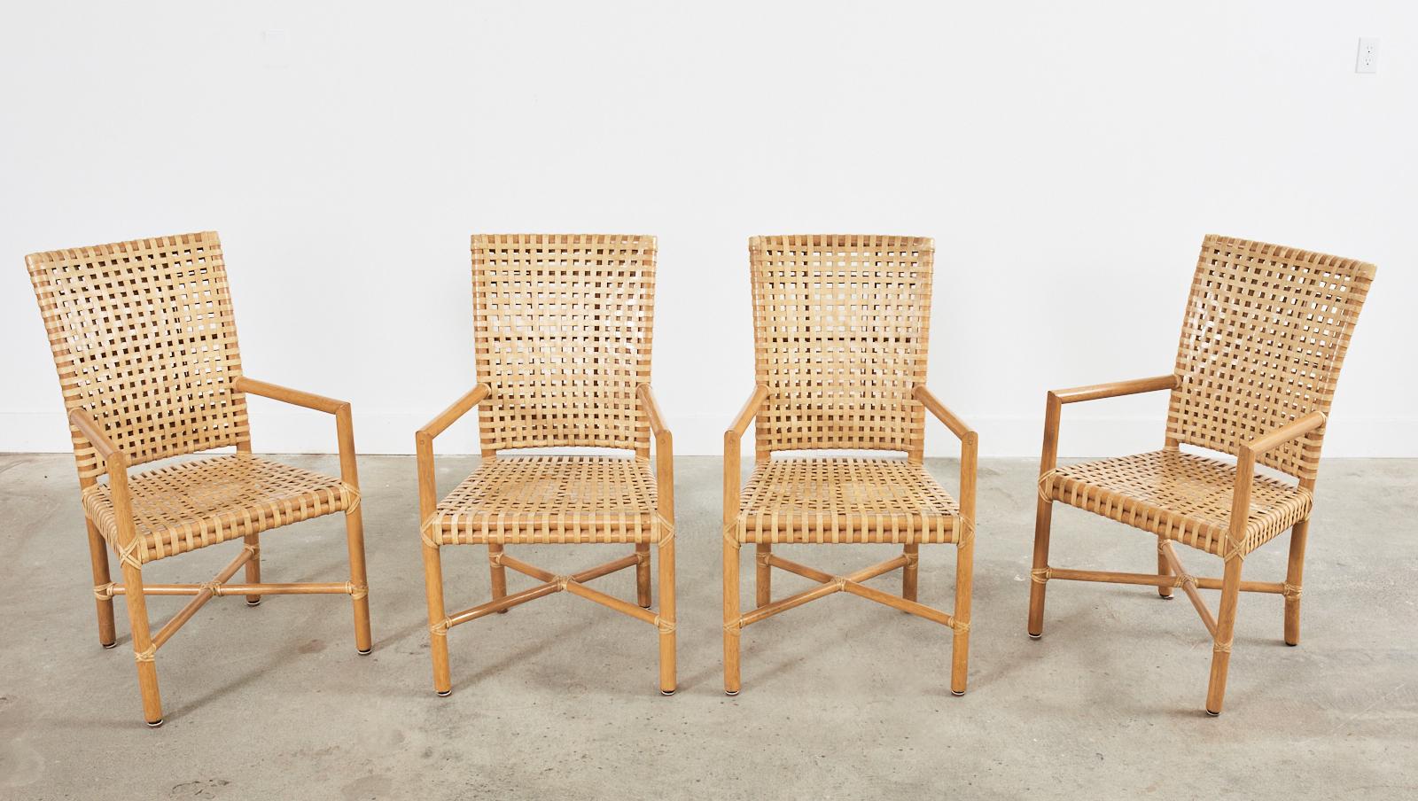 Organic Modern Set of Four McGuire Woven Rawhide Rattan Dining Armchairs For Sale