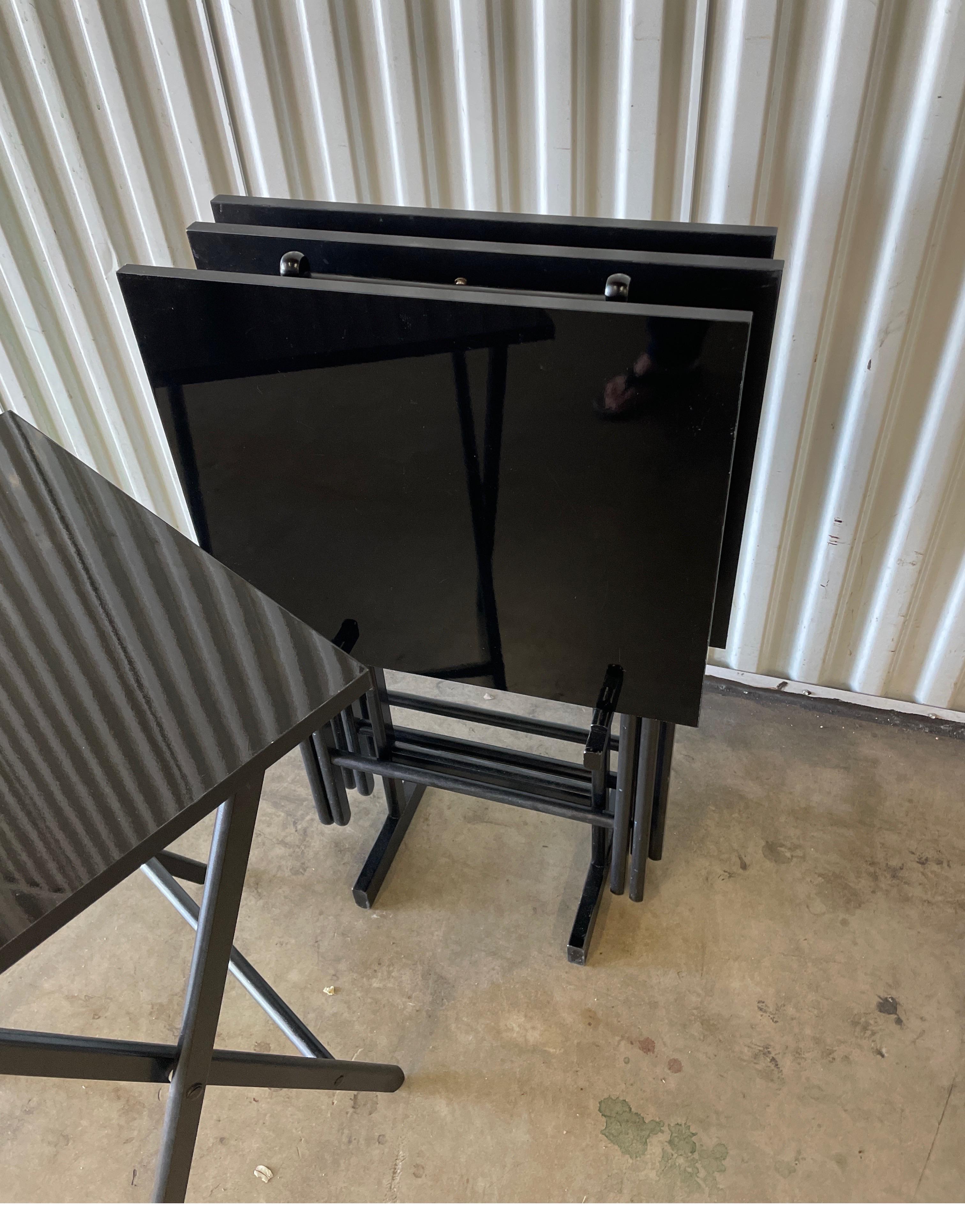 Set of Four MCM Black Laminate Folding Tray / Snack Tables with Stand In Good Condition For Sale In West Palm Beach, FL