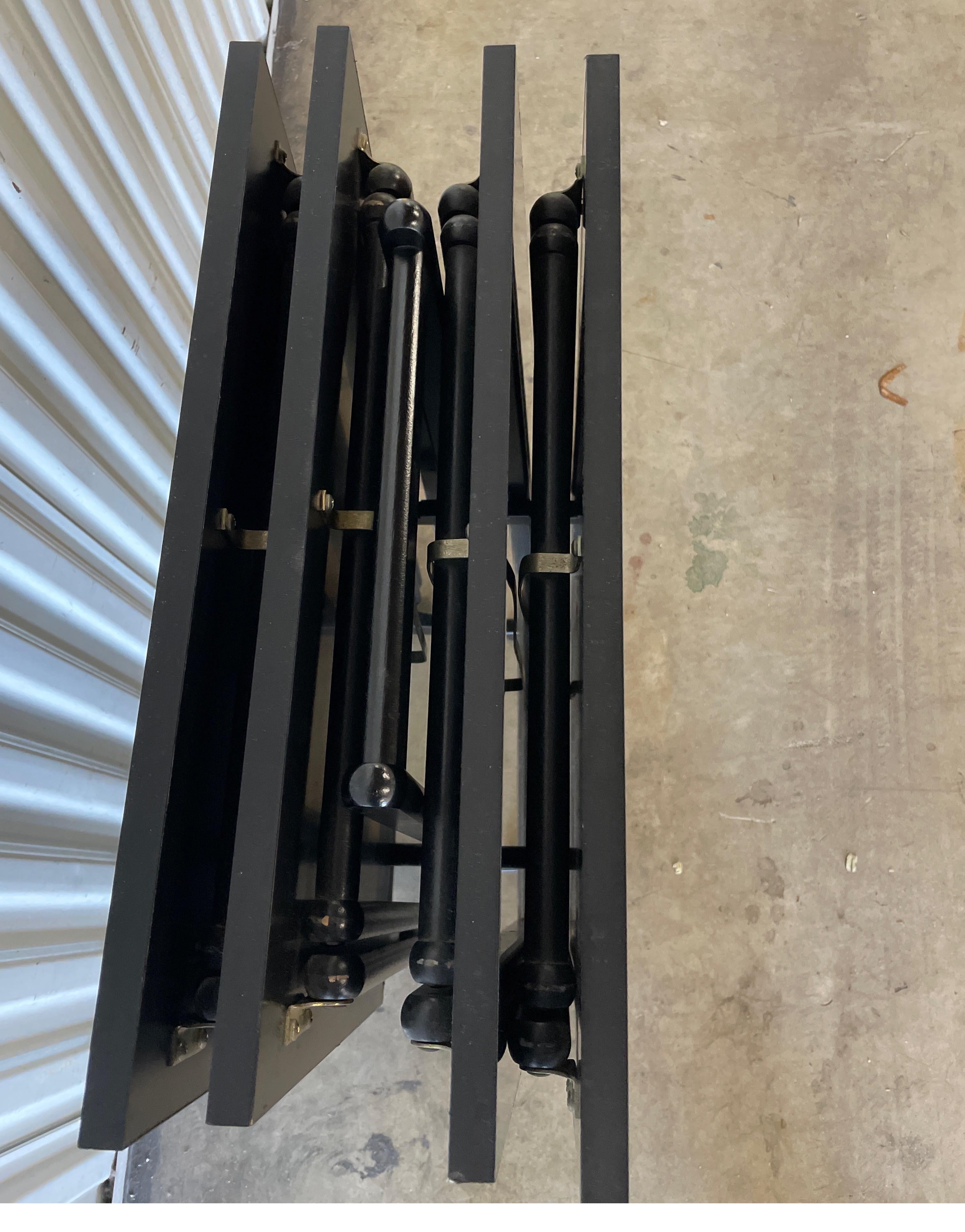 Set of Four MCM Black Laminate Folding Tray / Snack Tables with Stand In Good Condition In West Palm Beach, FL