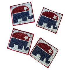 Lot de quatre sous-verres en perles "Éléphant du parti républicain" MCM