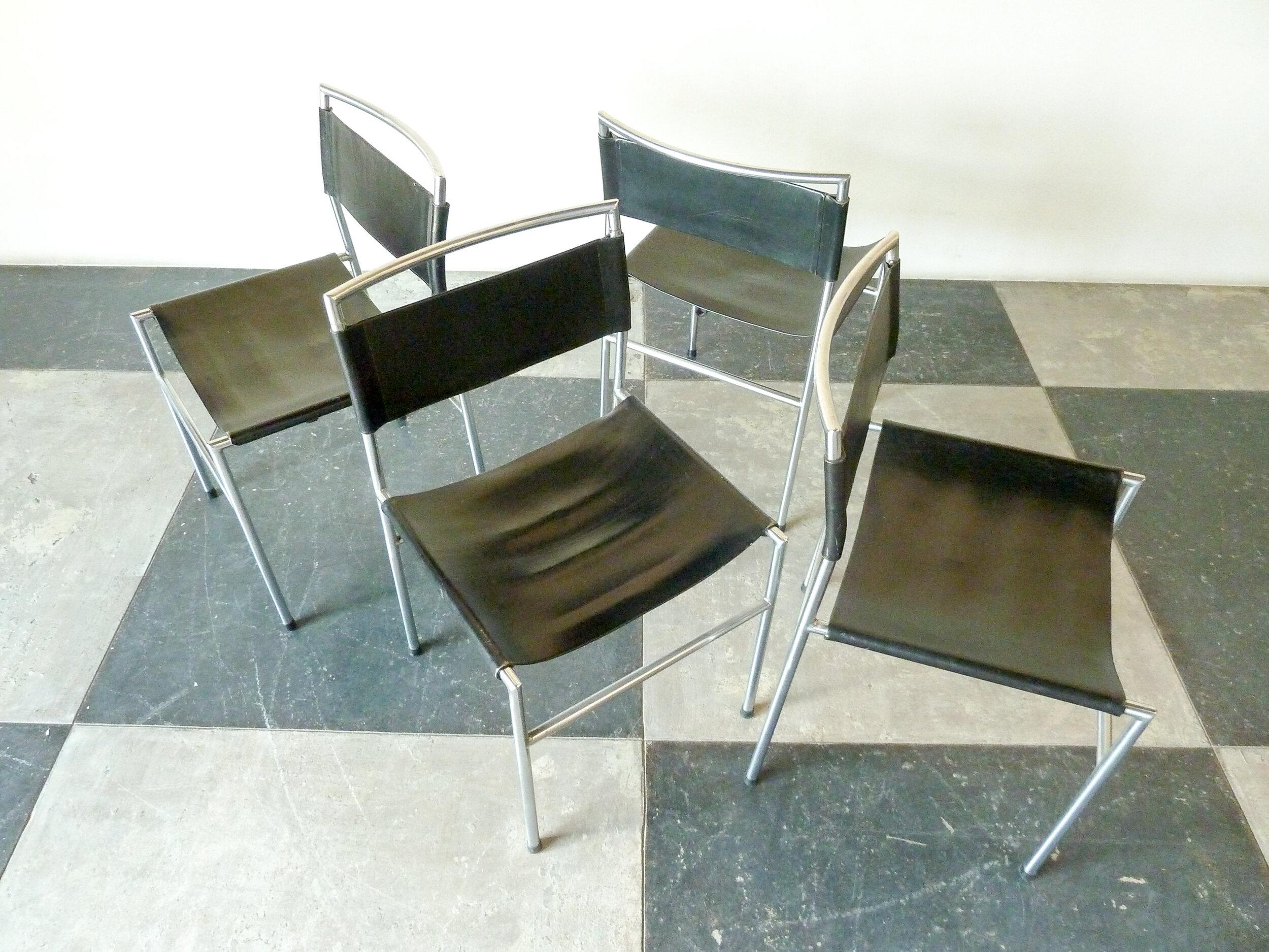 Set of Four Metaform dining chairs attributed to Arnold Merckx, 1943. The chairs are made of solid chrom metal frame with black saddle leather seat and back.

Approx dimensions: 31 1/2