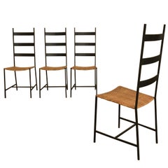Set of Four Metal and Cane Chairs