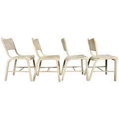 Ensemble de quatre chaises d'appoint industrielles en métal fabriquées par Doehler Metal Furn Co