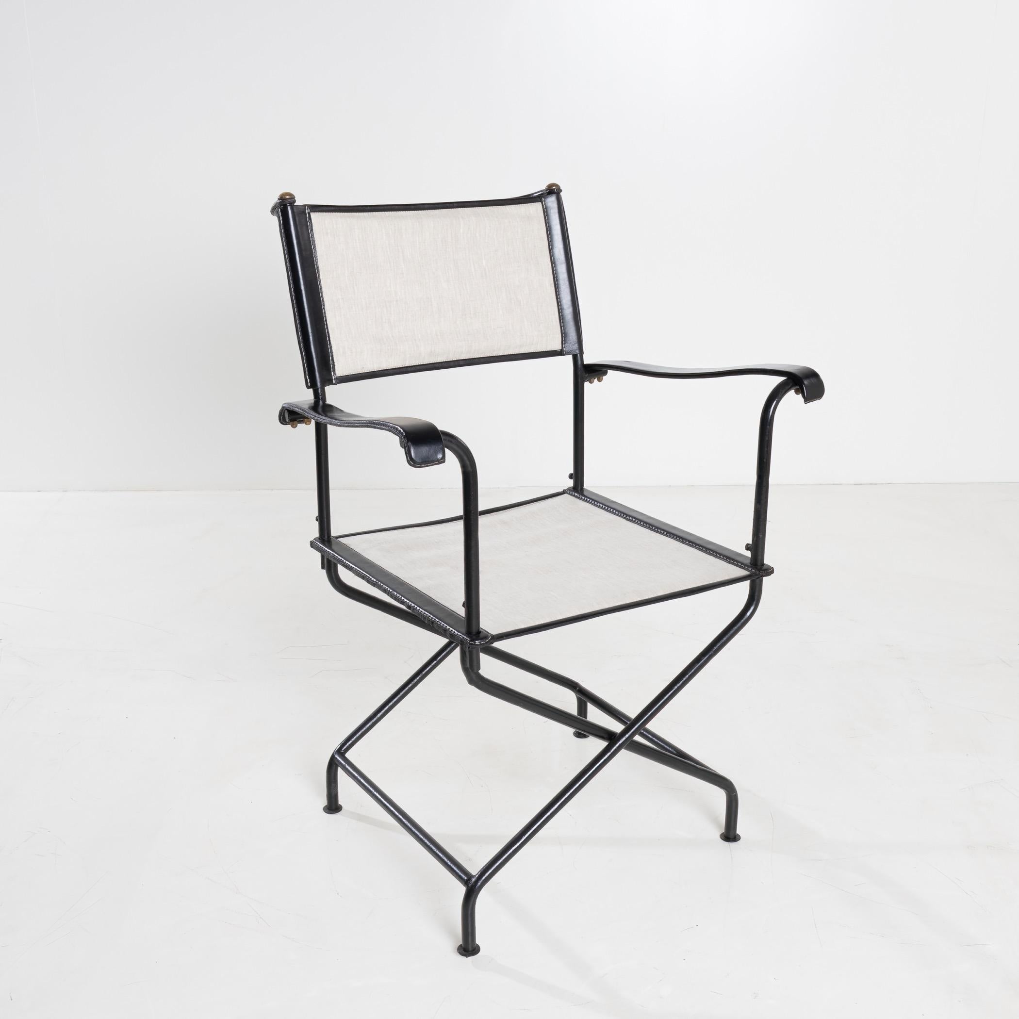 20th Century Set of four “Metteur en scène” (director’s) armchairs by Jacques Adnet  For Sale