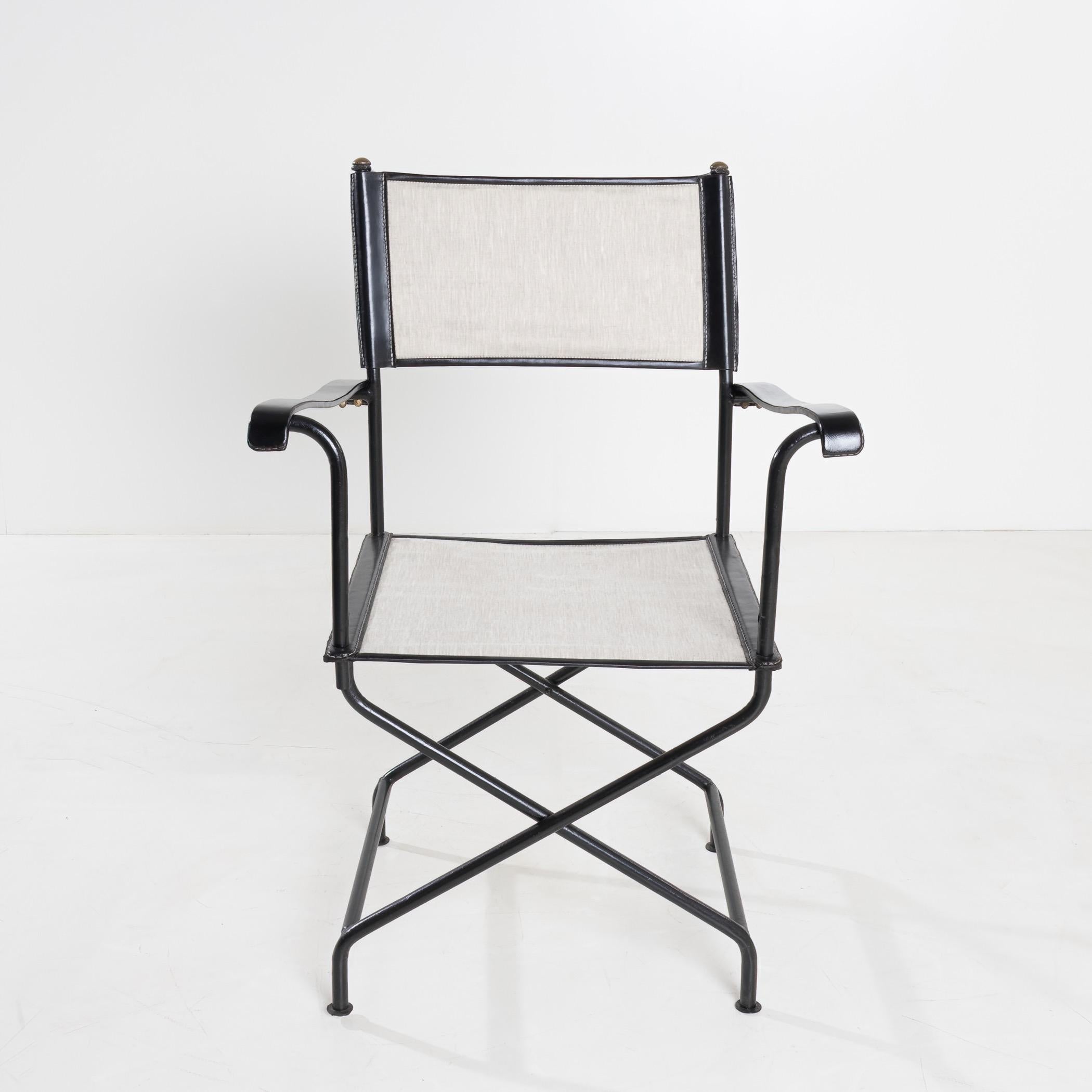 Leather Set of four “Metteur en scène” (director’s) armchairs by Jacques Adnet  For Sale