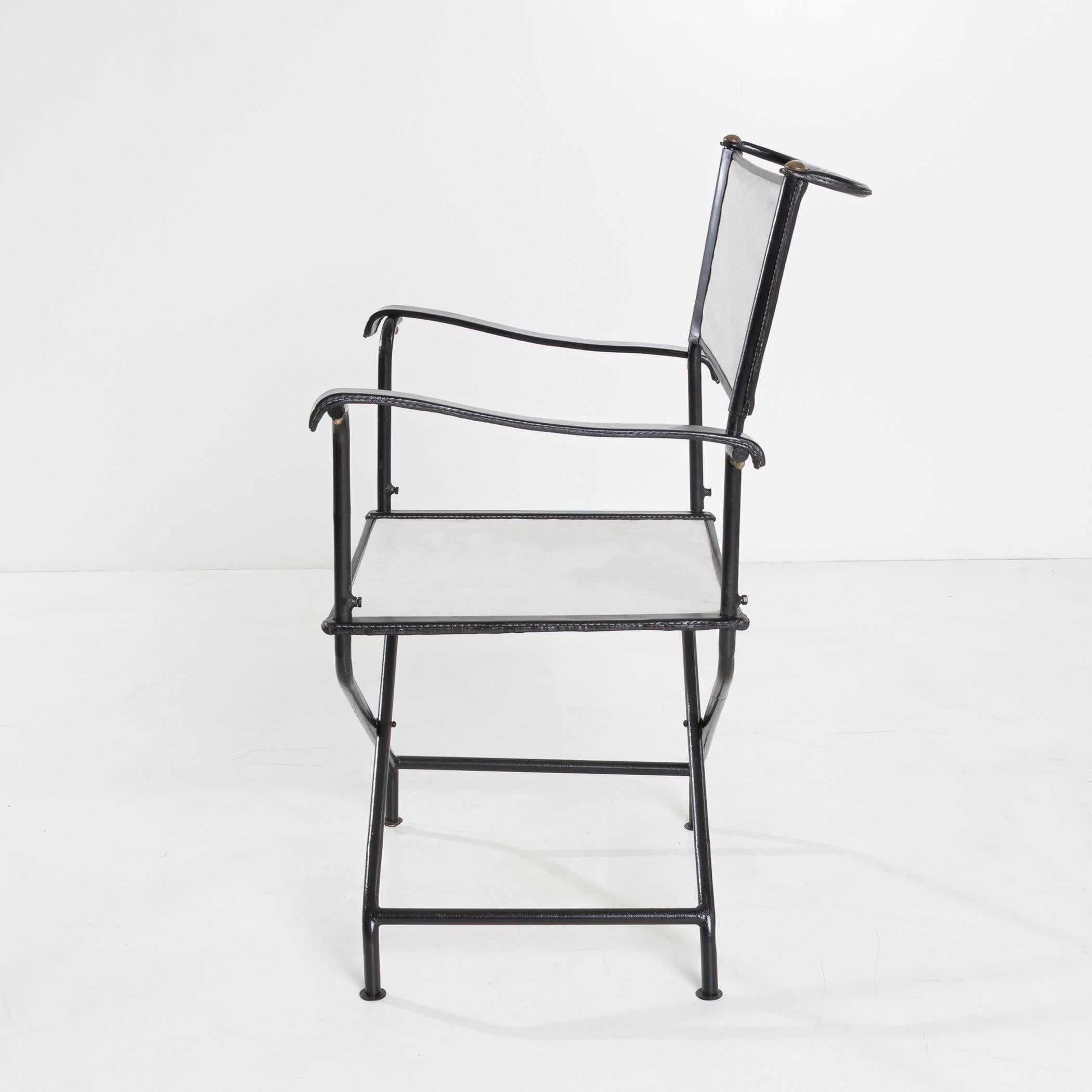 Set of four “Metteur en scène” (director’s) armchairs by Jacques Adnet  For Sale 1