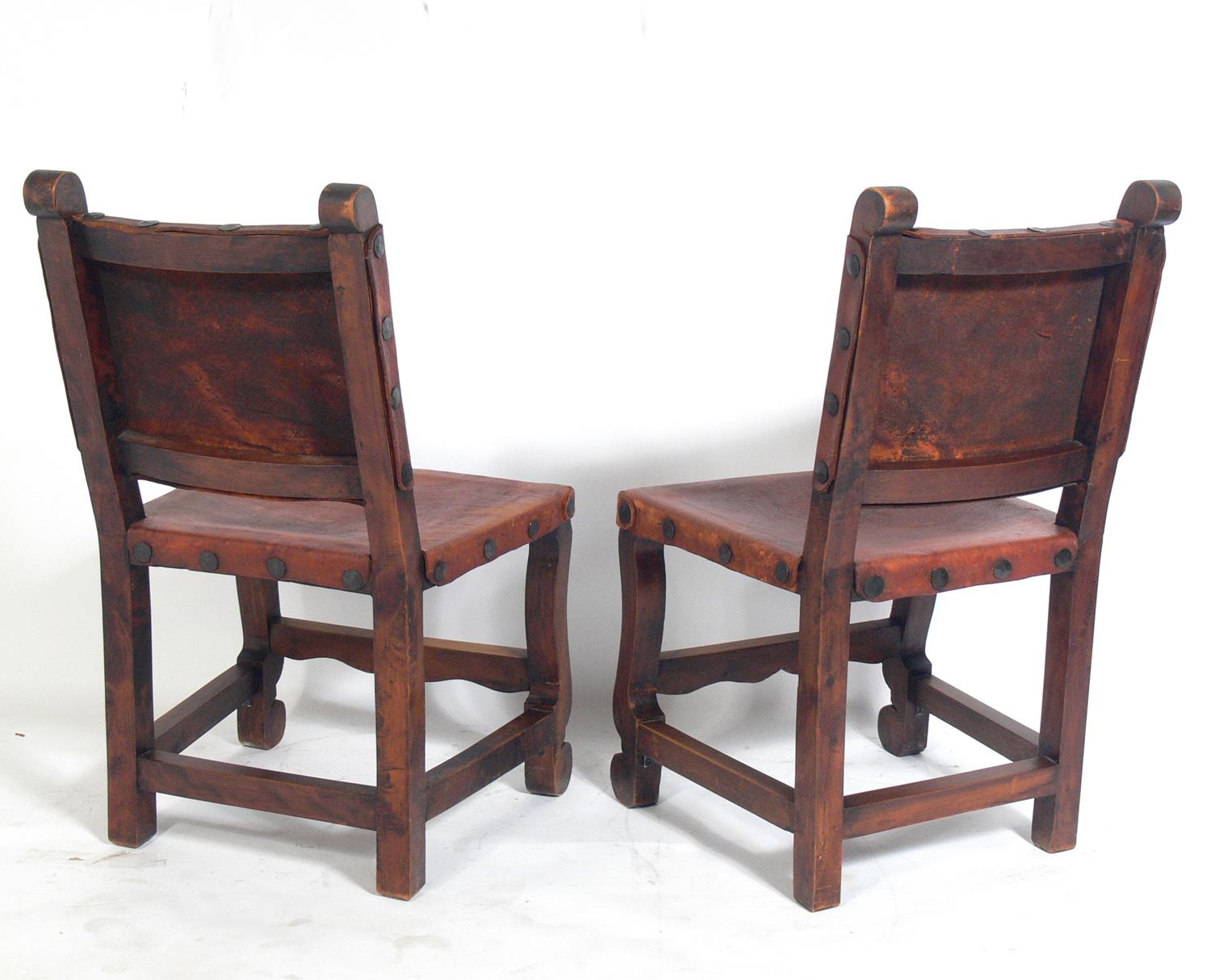 Set of Four Mexican Leather Dining Chairs In Distressed Condition In Atlanta, GA