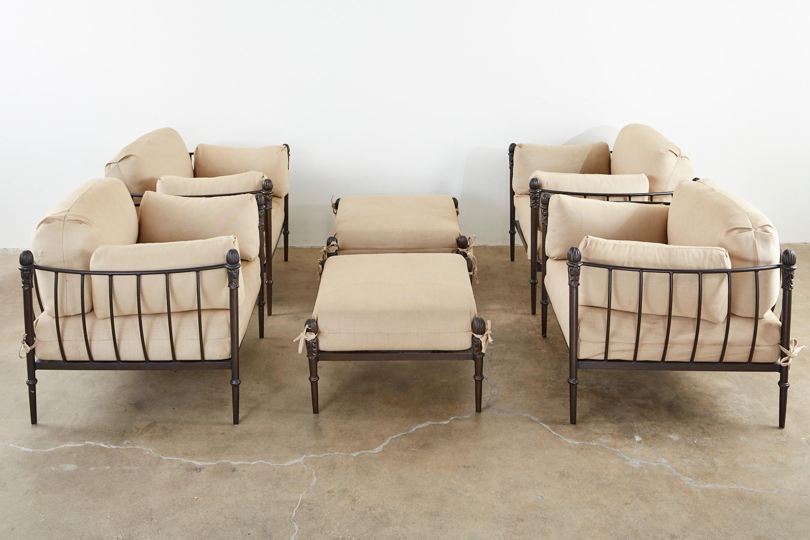 Stately set of four oversized lounge chairs and two ottomans constructed from bronzed solid aluminum. Designed by Michael Taylor from his Montecito line of 