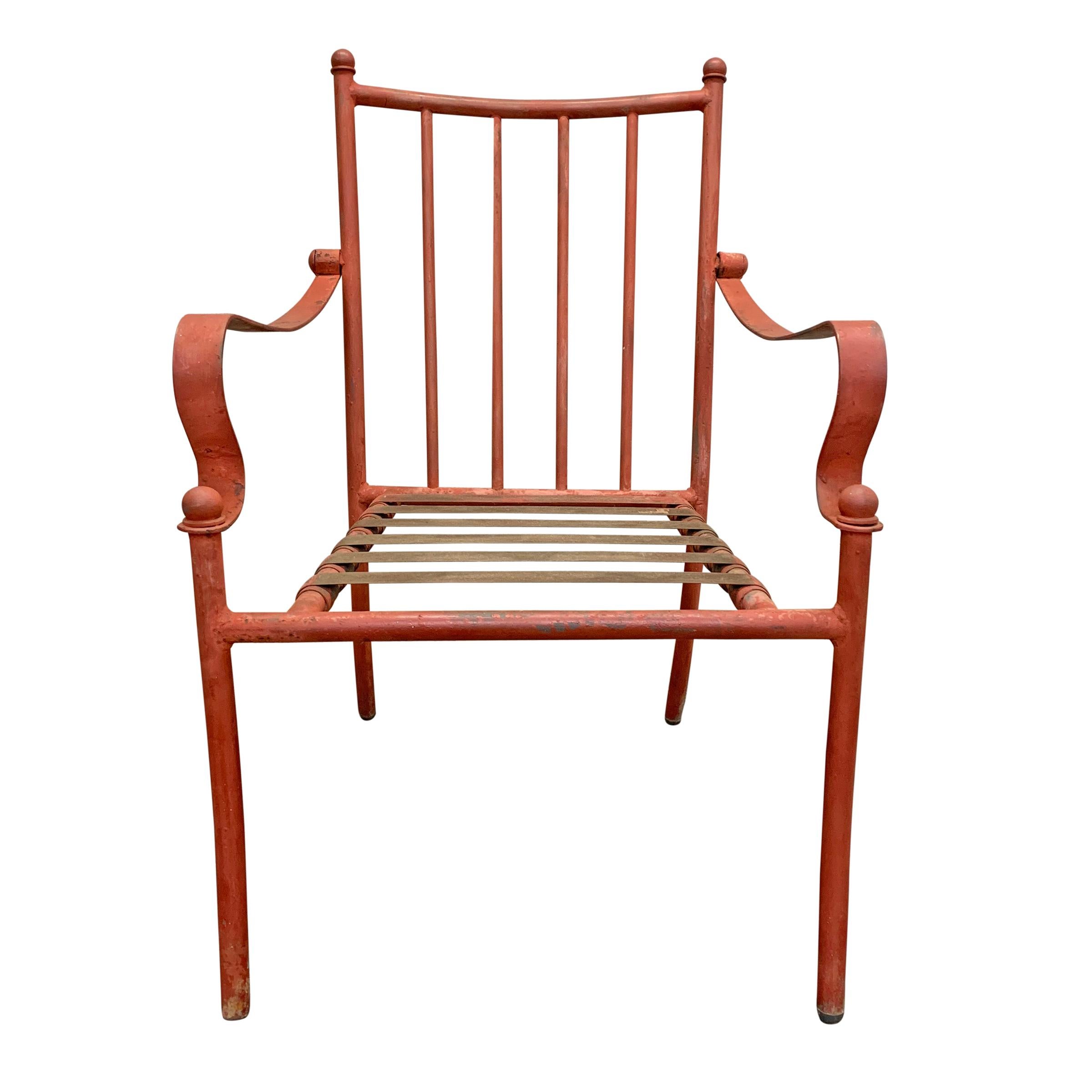 A wonderful set of four mid-20th century American iron frame patio chairs with fantastic scrolled arms, and tubular frames. These are really well constructed with solid materials and excellent attention to detail. We have plans to have these