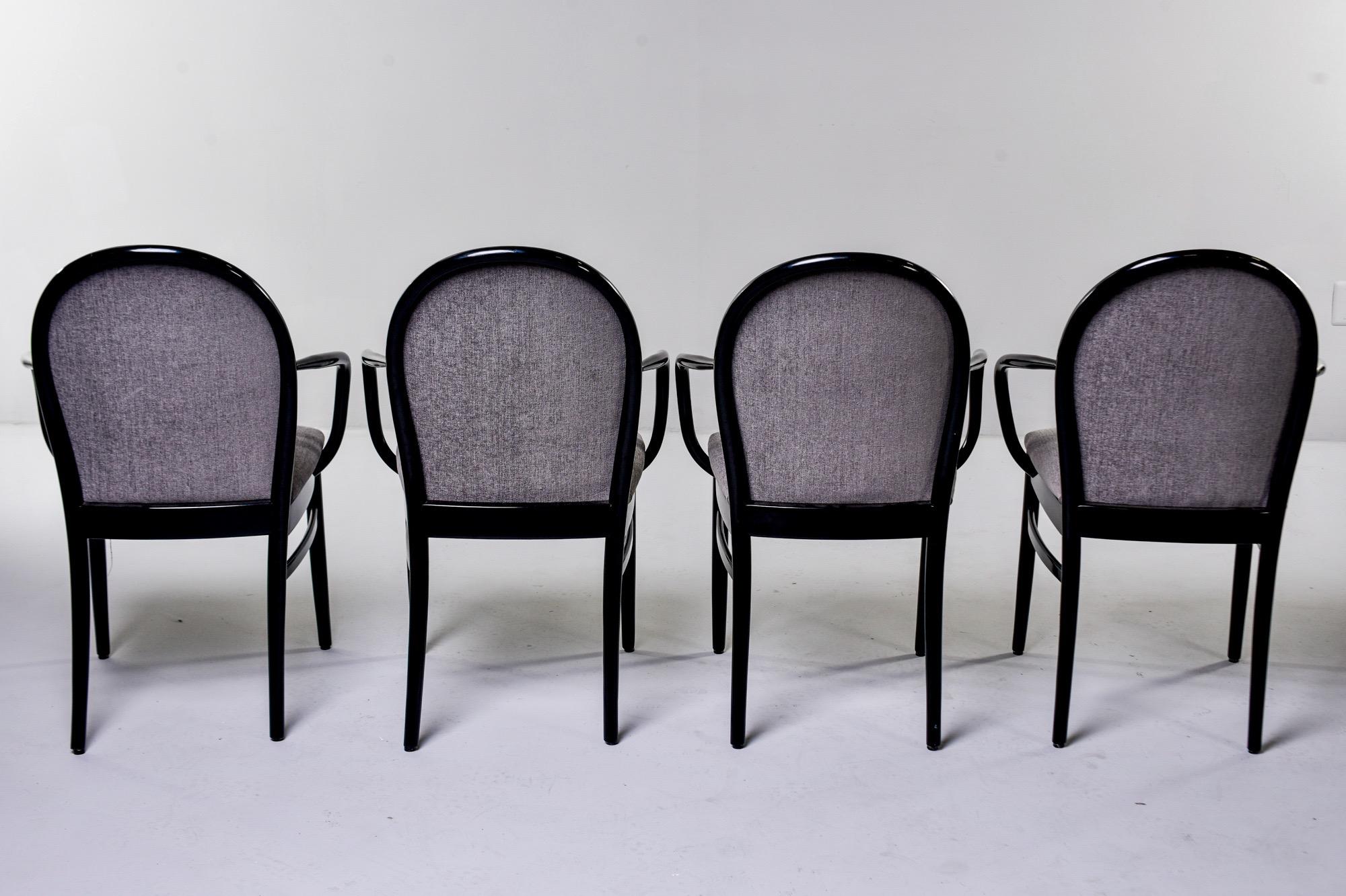 Found in England, this set of circa 1960s bentwood armchairs were professionally ebonized and reupholstered in a gray chenille velvet. Unknown maker. Sold and priced as a set of four.

Size: Arm height 25.5” to 27.5”, seat height 20”
Seat depth