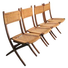 Juego de cuatro sillas de comedor plegables de cuerda de mediados de siglo, de Ebert Wels según Wegner